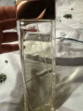 Salvatore Ferragamo Clear Glass Perfume Bottle with Gold-Tinted Liquid